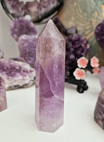 Gorgeous High Quality Rainbow Filled Amethyst Tower. High Quality and ethically mined, from Uruguay.